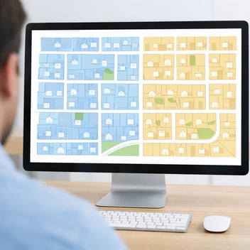 "Serviceable address database map showing classified property zones for a greenfield fiber deployment