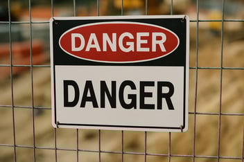 danger sign on wire fence