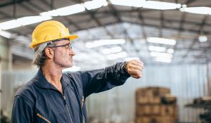 field engineer looking at watch